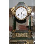 A 19th Century French mantel clock in green tortoiseshell effect portico case, gilt metal mounts,