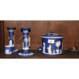 A pair of Wedgwood blue jasperware candlesticks, a similar coffee can, a pair of plated salad