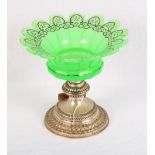 A 19th Century continental green glass and silver decorated table centre with white metal circular