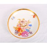 A Russian porcelain saucer dish (Popov) decorated floral sprays and gilt border, 5" dia