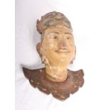 An antique Burmese carved and painted hardwood head of a dancer with mask, 13" high overall