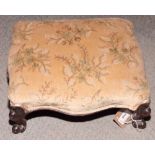 A 19th Century carved mahogany rectangular footstool, on cabriole supports, 13 1/2" wide