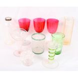 Three wine glasses with ruby bowls and a collection of assorted coloured glass, etc