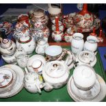 A large collection of oriental eggshell tea wares, Satsuma and Kutani decorated vases, teapots, etc