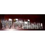 A set of six wine glasses cut ovals and flutes, seven matching port glasses and seven tumblers