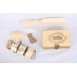 A 19th Century French prayer book with ivory bindings, a carved ivory shoe horn, an ivory three-