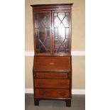 An Edwardian mahogany and satinwood banded bureau bookcase enclosed astragal beaded glazed doors,