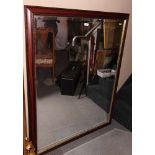 A modern rectangular bevelled plate wall mirror in mahogany and gilt effect frame, 40" x 53"