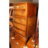 A walnut miniature lowboy, fitted five drawers, on shell carved cabriole supports, 16" wide