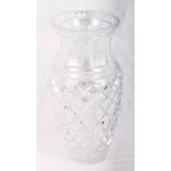 A diamond cut glass flower vase, 12" high