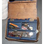 A collection of watchmaker's tools and parts