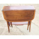 An Edwardian mahogany and satinwood banded occasional table, on square supports with decorative