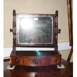 A 19th Century mahogany framed dressing mirror on bowfront base fitted three drawers