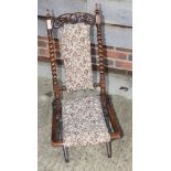 A Victorian folding occasional chair with tapestry covered back and seat