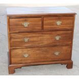 A 19th Century Georgian design mahogany chest of two short and two long drawers with pierced brass