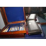 A set of six plated fish knives and forks, in mahogany case, a set of six ivory handled fruit knives