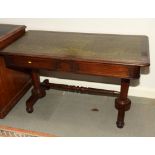 An early 19th Century rosewood library table inlet leather top, fitted two frieze drawers, on