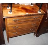 An Edwardian mahogany and satinwood banded chest of three drawers, 33" wide