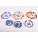 A Royal Crown Derby dessert plate, a Spode Imari decorated plate, a blue and white plate and three