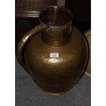 A brass water jug, five copper saucepans, in sizes, three shallow dishes, a table bell and a ladle