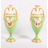 A pair of Copeland slender oviform vases with gilt handles, decorated in green and gilt with named