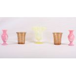 A pair of Victorian aventurine glass vases, a pair of pink glass vases with Mary Gregory style