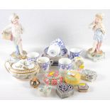 A pair of continental bisque figures of children (one damaged), a blue and white part coffee set and