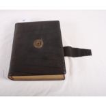 A Victorian leatherbound photograph album containing family portraits including some military and