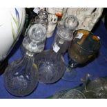 A pair of mid 19th Century anthemion etched decanters and stoppers, a spirits decanter, a studio