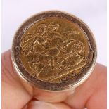 A 1968 gold sovereign in 9ct gold ring mount, 19g