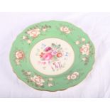 A set of three Copeland Spode green and gilt decorated cabinet plates with floral painted centres,