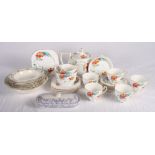 A 1930s floral decorated bone china part tea service, a Myott dessert service and a Davenport