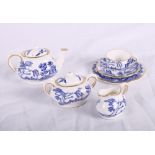 A doll's Coalport Willow pattern tea set for one