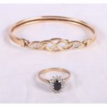 A yellow gold bracelet and a 9ct gold cluster ring