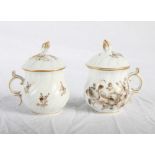 A pair of early 19th Century Ludwigsburg gilt and sepia decorated custard cups and covers