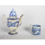 An early 19th Century blue and white coffee pot with cottage, children and pigsty decoration, 11"