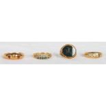 Three 18ct gold and gem set dress rings and a yellow metal and bloodstone set signet ring engraved