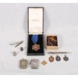 A silver vesta case, two silver thimbles, four silver medallions and other items, various