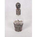 A continental silver mounted miniature decanter, London import marks