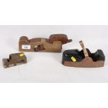 A mahogany, brass and steel infilled woodworking plane stamped J Holland London, another with blade