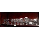 A set of five Stuart crystal wine glasses, a set of six crystal sundae glasses, champagne glasses,