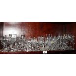 A large collection of assorted drinking glasses