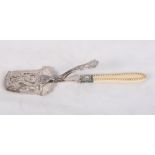 A silver plated sandwich server with pierced and engraved decoration and carved ivory handle