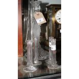 A glass candlestick with frosted stem moulded as a classical maiden on reeded circular base, 12"
