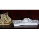 Two pairs of marbled alabaster bookends carved scrolls and a curved plaster panel of a winged