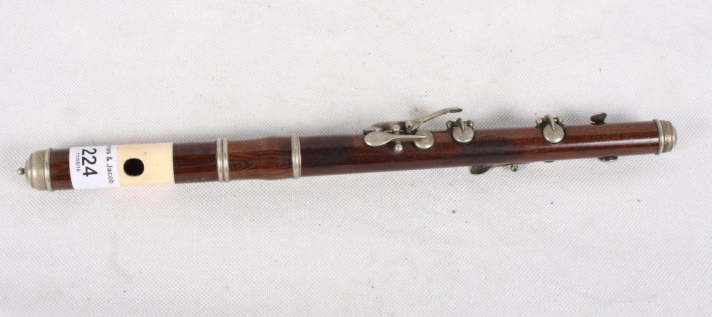 A 19th Century rosewood and ivory piccolo, 12" long