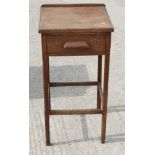 An oak bedside table, fitted one drawer, 15" wide, and a coffee table with sawn plank top