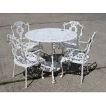 A white painted cast aluminium circular garden table, 36" dia, and a set of four chairs