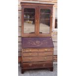 A George III mahogany bureau bookcase decorated rosewood crossbands and box line inlay, the upper