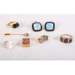 A 14ct gold and onyx ring, a 9ct gold 10 shilling note charm and other jewellery